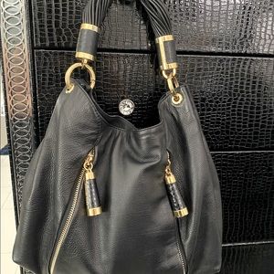 Michael Kors black and gold handbag